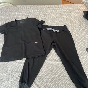 Figs. Black size Medium with petite joggers.